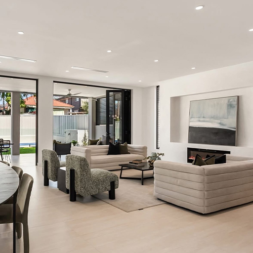 Open plan living and dining area with modern fireplace