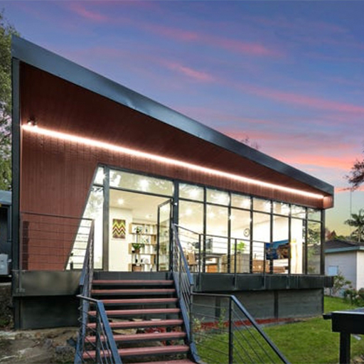 Modern architectural home exterior at dusk built by Ronson Group